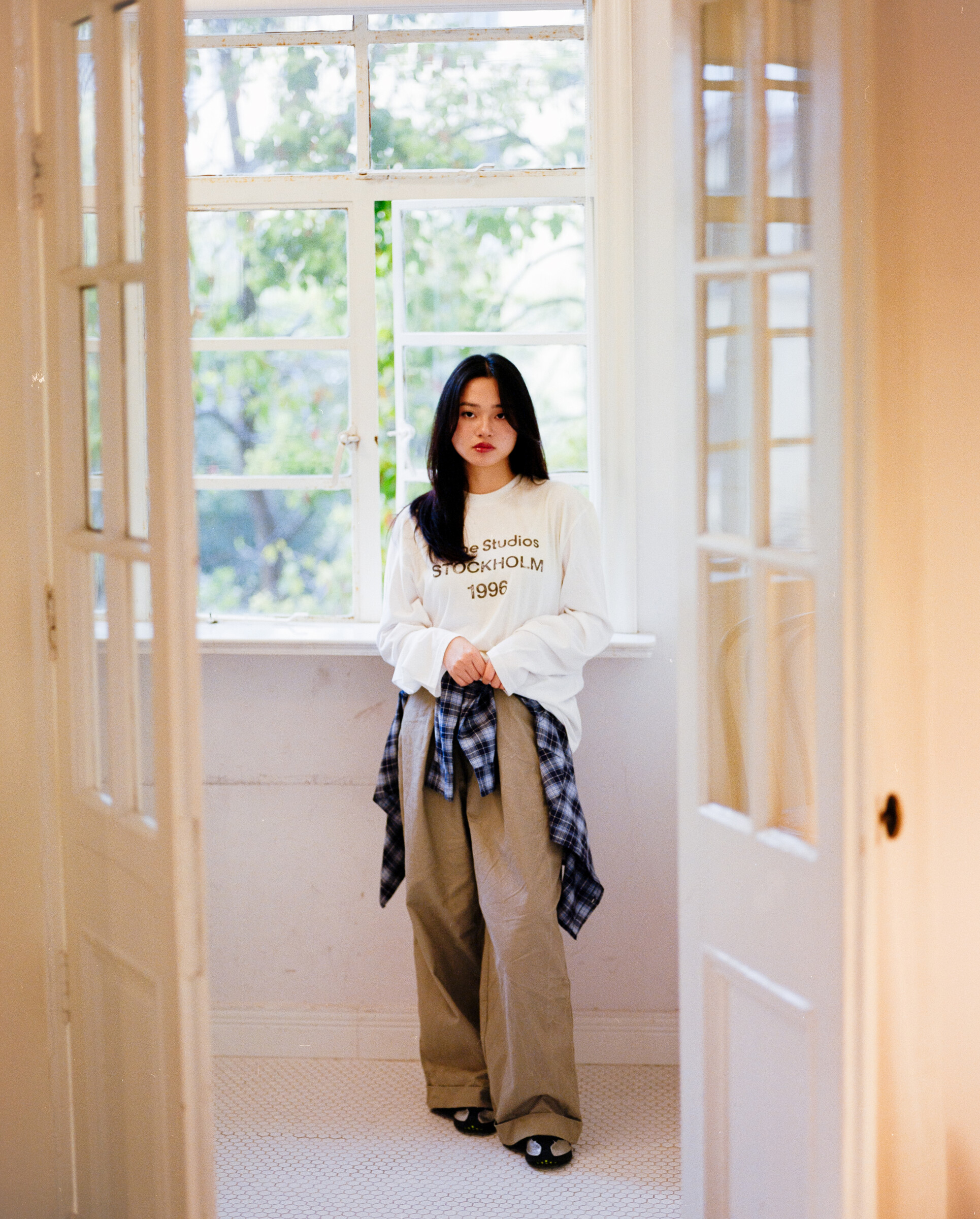 Portrait in a sunlit doorway