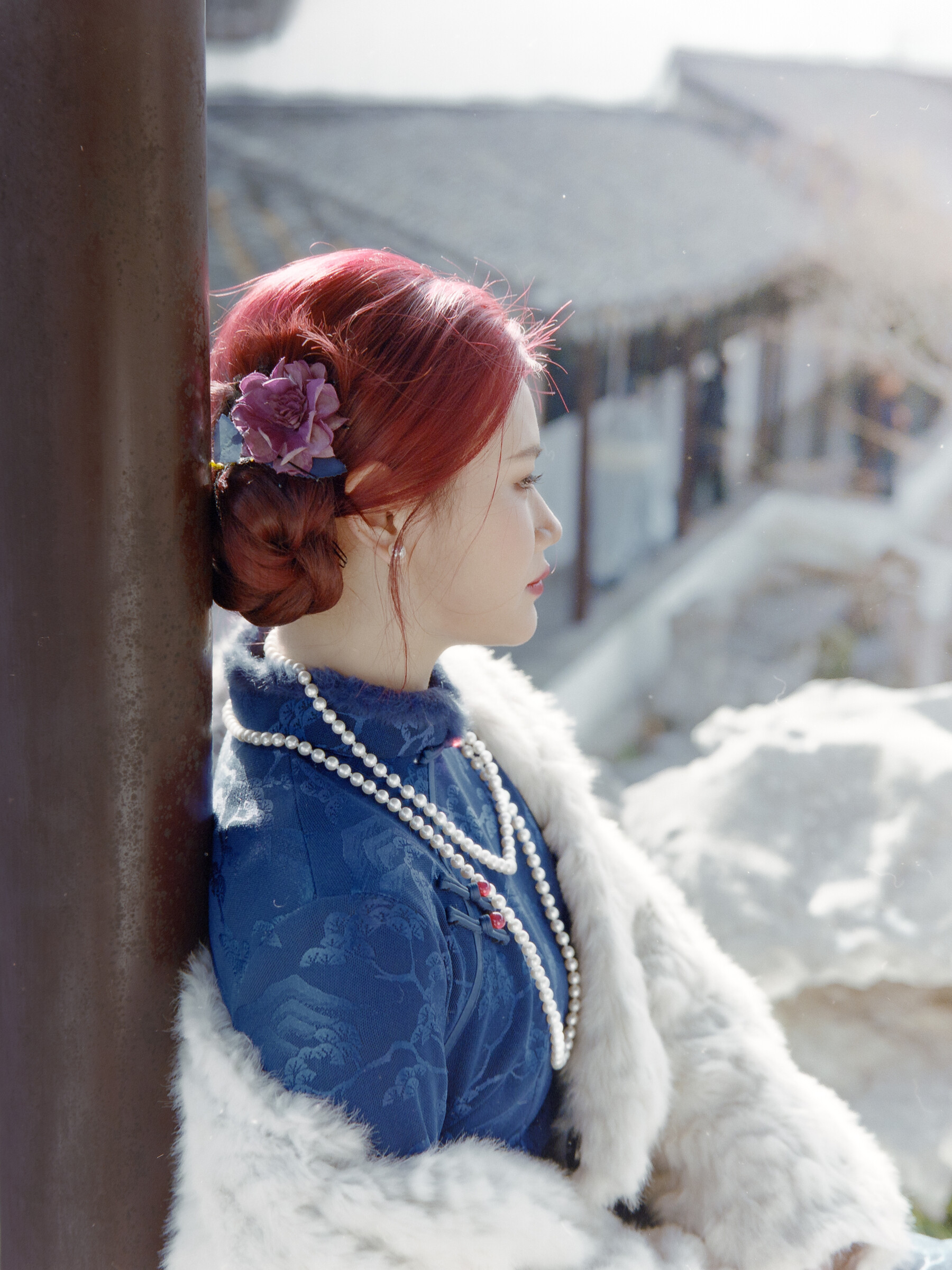 Red-haired portrait in snow